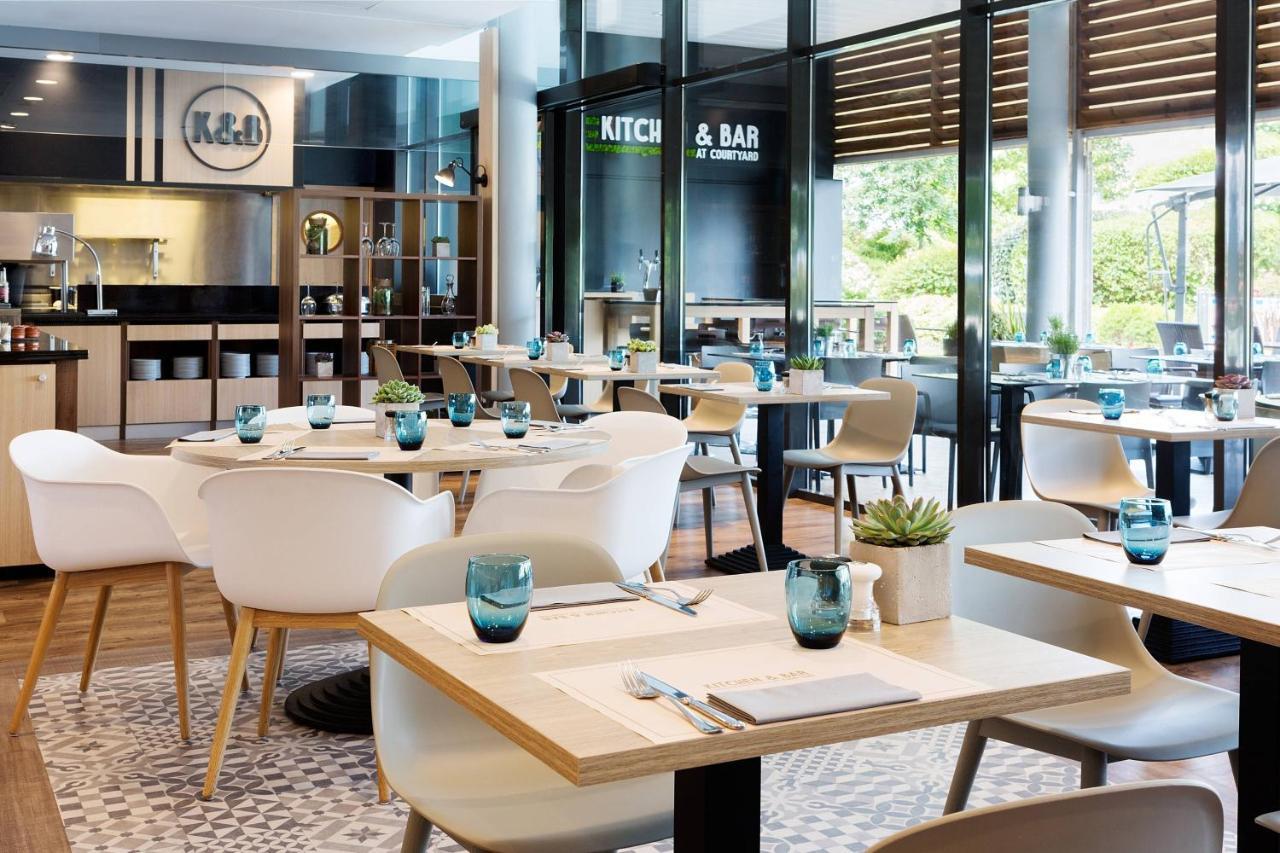 Отель Courtyard By Marriott Toulouse Airport Экстерьер фото